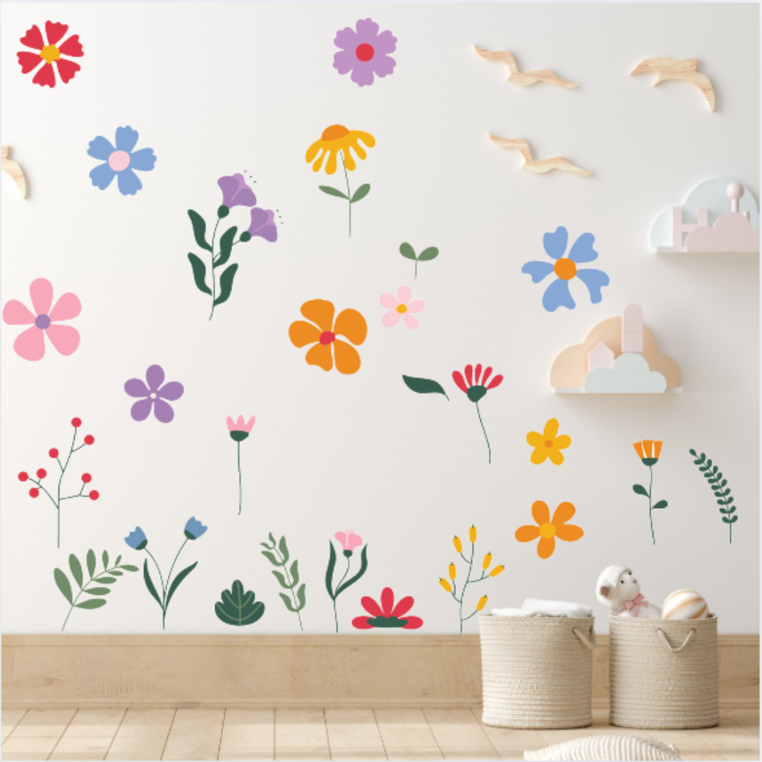 Colorful floral wall decals on a white wall with wooden flooring.