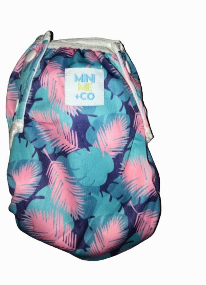 Stylish Feather Swim Nappy: Mini Me & Co swim nappy with a trendy feather design, providing a snug fit and peace of mind for parents.