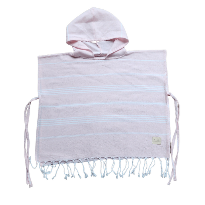 Luxurious kids poncho towel made from 100% organic Turkish cotton, showcasing soft texture and stylish design.
