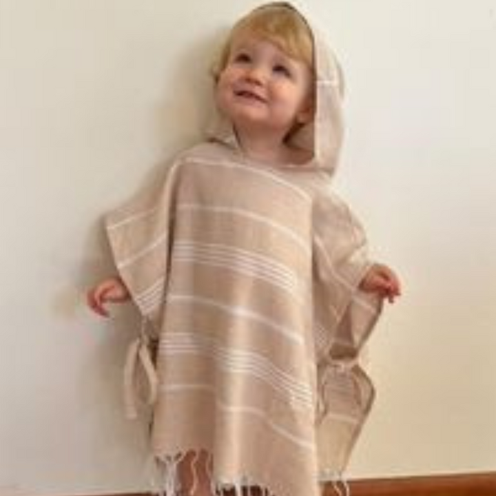 Durable and non-toxic kids poncho towel designed to withstand daily use, keeping your child's skin safe and comfortable.