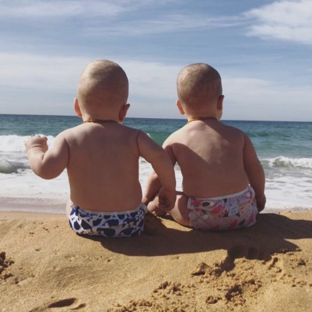 Mini Me & Co whale design reusable swim nappy with adjustable fit for babies and toddlers.