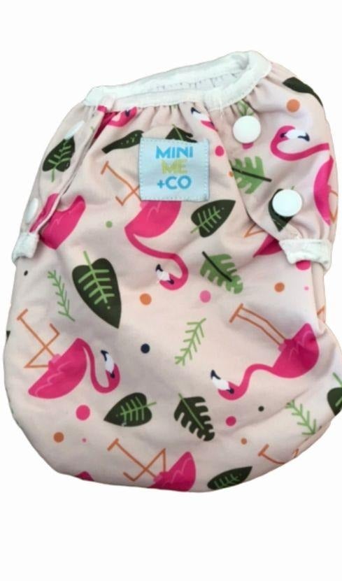 Large Flamingo Swim Nappy: Let your toddler swim in style with our large flamingo swim nappy! Featuring a playful flamingo print, this nappy offers leak-proof protection and a comfortable fit for toddlers 10kg and up. Made from soft, eco-friendly fabrics, it’s designed for durability and ease of use. Reusable and fashionable, this swim nappy is perfect for fun in the sun.

